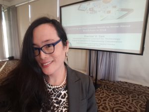 Rachel See presenting on blockchain at a 2018 conference