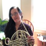 Rachel See performing with french horn, May 2020